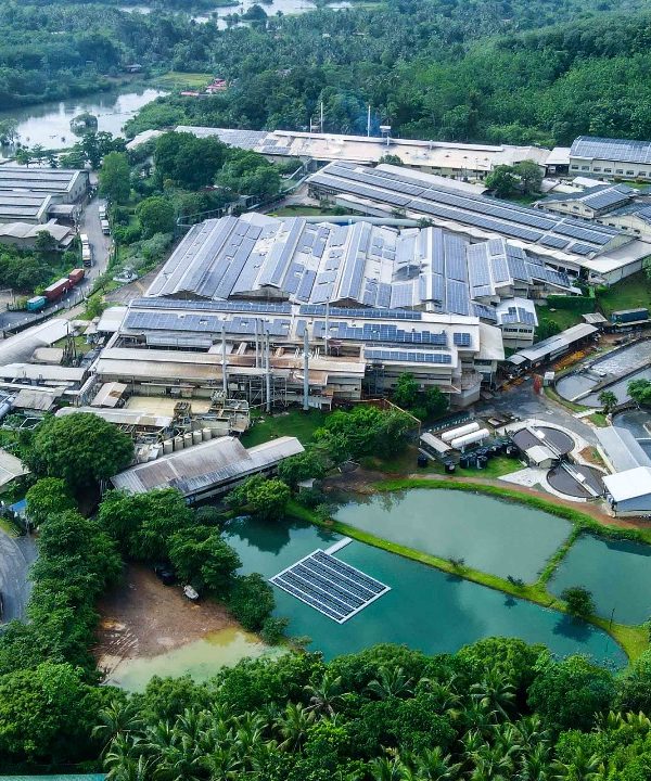 aerial view of hayleys fabric plc with rooftop and floating solar installation by hayleys solar, enhancing renewable energy adoption
